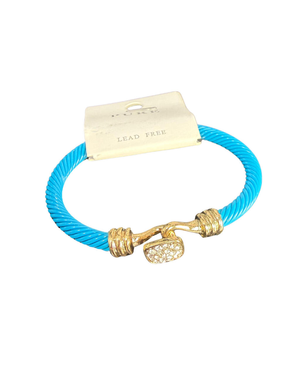 Blue cable cuff bracelet with gold accents and a crystal‑decorated end.